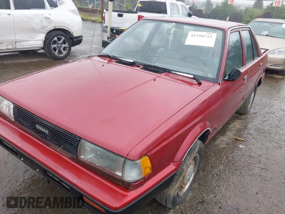 1990 Nissan Sentra z VIN JN1GB21B5LU503902, wystawiony jako IAAI lot #42358723 z przebiegiem 172 484 mil mil oraz . Historia ofert i sprzedaży dostępna na DreamBid. Obrazek 6.