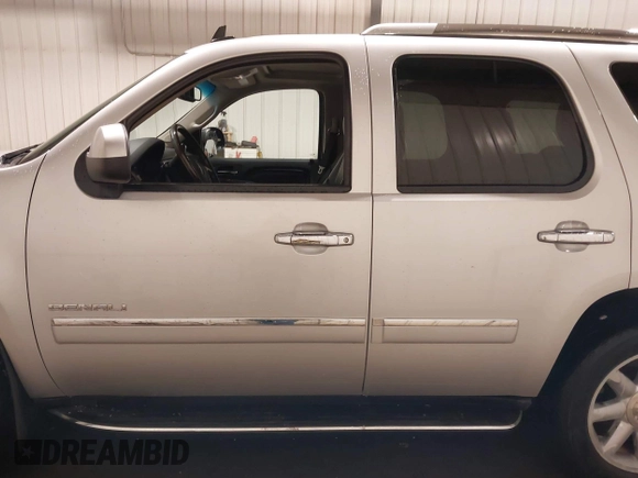 2014 GMC Yukon Denali with VIN 1GKS2EEF0ER134804, listed as a IAAI auction lot 41582709 with 142,192 mi miles. Bid and sale history available at carsss.com. Image 15.