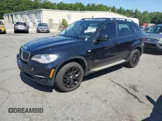 2012 BMW X5 35i with VIN 5UXZV4C54CL752079, listed as a Copart auction lot 62147515 with 147,244 mi miles and Clean title. Bid and sale history available at DreamBid. Image 1.