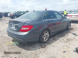 2014 Mercedes-Benz C 250 Sport with VIN WDDGF4HB0EA936265, listed as a IAAI auction lot 42090412 with 113,695 mi miles and . Bid and sale history available at DreamBid. Image 4.
