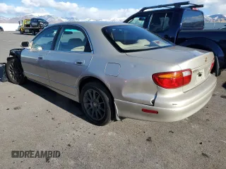1997 Mazda Millenia S z VIN JM1TA2229V1307575, wystawiony jako Copart lot #87040954 z przebiegiem 160 513 mil mil oraz Szkody całkowita. Historia ofert i sprzedaży dostępna na DreamBid. Obrazek 2.