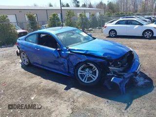 2014 BMW 4 Series 428i xDrive z VIN WBA3N5C50EF715770, wystawiony jako IAAI lot #41803713 z przebiegiem 77 602 mil mil oraz . Historia ofert i sprzedaży dostępna na DreamBid. Obrazek 1.