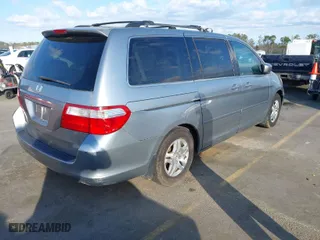 2007 Honda Odyssey EX-L with VIN 5FNRL38627B132925, listed as a IAAI auction lot 41793141 with 168,000 mi miles. Bid and sale history available at carsss.com. Image 4.