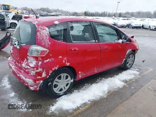 2010 Honda Fit with VIN JHMGE8H21AC022186, listed as a IAAI auction lot 41843435 with 144,634 mi miles. Bid and sale history available at carsss.com. Image 4.