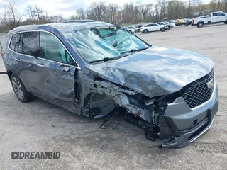 2020 Cadillac XT6 FWD Premium Luxury z VIN 1GYKPCRS9LZ129763, wystawiony jako IAAI lot #42052532 z przebiegiem 57 670 mil mil oraz . Historia ofert i sprzedaży dostępna na DreamBid. Obrazek 1.