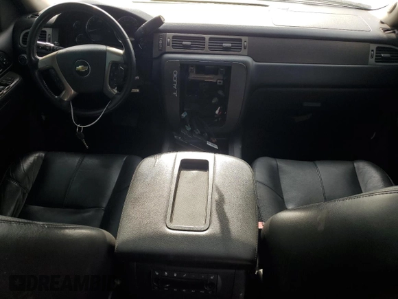 2013 Chevrolet Tahoe LT with VIN 1GNSKBE01DR176751, listed as a Copart auction lot 60303165 with 201,672 mi miles and Salvage title. Bid and sale history available at DreamBid. Image 8.