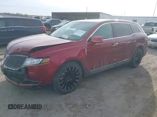 2014 Lincoln MKT EcoBoost with VIN 2LMHJ5ATXEBL58430, listed as a IAAI auction lot 41657571 with 58,502 mi miles and . Bid and sale history available at DreamBid. Image 2.