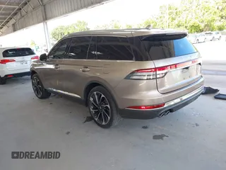 2020 Lincoln Aviator Reserve with VIN 5LM5J7XC0LGL10343, listed as a IAAI auction lot 42486201 with 62,418 mi miles and . Bid and sale history available at DreamBid. Image 3.