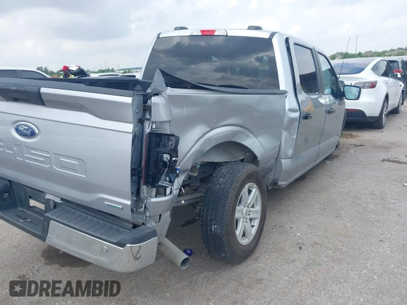 2023 Ford F-150 XL with VIN 1FTEW1C80PFA34183, listed as a IAAI auction lot 42085791 with 60,454 mi miles and . Bid and sale history available at DreamBid. Image 4.