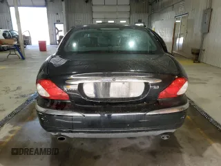 2003 Jaguar X-Type 3.0L z VIN SAJEA51C33WD25630, wystawiony jako Copart lot #57795475 z przebiegiem 135 514 mil mil oraz Szkody całkowita. Historia ofert i sprzedaży dostępna na DreamBid. Obrazek 6.