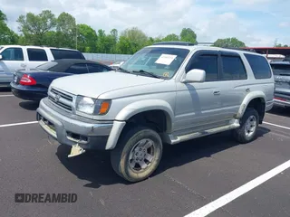 2000 Toyota 4Runner SR5 with VIN JT3GN86R1Y0166533, listed as a IAAI auction lot 42103772 with 279,272 mi miles and . Bid and sale history available at DreamBid. Image 2.