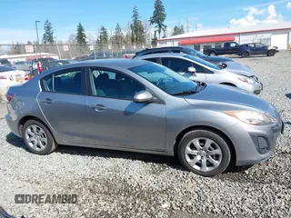 2011 Mazda Mazda3 i Sport with VIN JM1BL1UG4B1480828, listed as a IAAI auction lot 41868170 with 136,876 mi miles. Bid and sale history available at carsss.com. Image 13.
