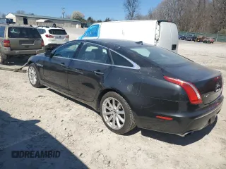 2013 Jaguar XJ Portfolio with VIN SAJWJ2GDXD8V45921, listed as a Copart auction lot 49289825 with 115,152 mi miles and Salvage title. Bid and sale history available at DreamBid. Image 2.