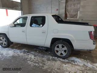 2014 Honda Ridgeline RTL with VIN 5FPYK1F55EB012490, listed as a IAAI auction lot 41391884 with 130,121 mi miles. Bid and sale history available at carsss.com. Image 14.