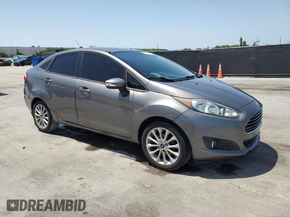 2014 Ford Fiesta SE z VIN 3FADP4BJ4EM110277, wystawiony jako Copart lot #56921115 z przebiegiem 126 536 mil mil oraz Szkoda całkowita • Salvage title. Historia ofert i sprzedaży dostępna na DreamBid. Obrazek 4.