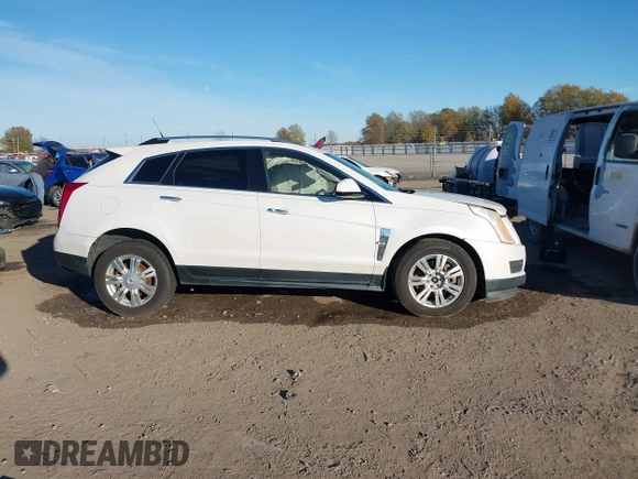 2012 Cadillac SRX Luxury Collection z VIN 3GYFNAE37CS576292, wystawiony jako IAAI lot #41048054 z przebiegiem 158 948 mil mil oraz . Historia ofert i sprzedaży dostępna na DreamBid. Obrazek 13.