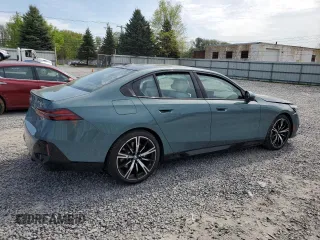 2024 BMW 5 Series 540i xDrive with VIN WBA63FJ03RCR13220, listed as a Copart auction lot 56892445 with Not provided miles and Salvage title. Bid and sale history available at DreamBid. Image 3.