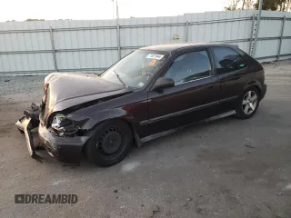 1999 Honda Civic CX with VIN 2HGEJ6428XH112747, listed as a Copart auction lot 77621944 with 105,852 mi miles and Salvage Title. Bid and sale history available at DreamBid. Image 1.