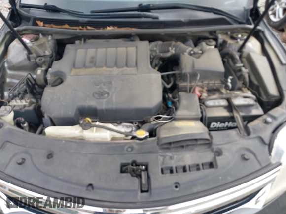 2013 Toyota Avalon XLE z VIN 4T1BK1EB0DU073513, wystawiony jako IAAI lot #42364719 z przebiegiem 208 242 mil mil oraz . Historia ofert i sprzedaży dostępna na DreamBid. Obrazek 10.