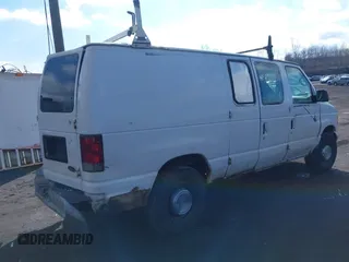 2001 Ford Econoline Cargo with VIN 1FTNE24221HB32842, listed as a IAAI auction lot 41677717 with 221,642 mi miles. Bid and sale history available at carsss.com. Image 4.