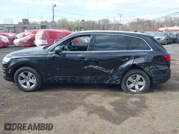 2019 Audi Q7 Premium with VIN WA1AHAF74KD034469, listed as a IAAI auction lot 42037259 with 92,404 mi miles and . Bid and sale history available at DreamBid. Image 14.