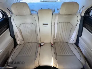 2019 Genesis G90 z VIN KMTF54JH1KU054539, wystawiony jako Copart lot #53653765 z przebiegiem 27 024 mil mil oraz Nie do naprawy. Historia ofert i sprzedaży dostępna na DreamBid. Obrazek 10.