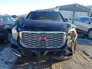 2019 GMC Yukon Denali with VIN 1GKS2CKJ2KR137664, listed as a IAAI auction lot 41335229 with 151,394 mi miles and . Bid and sale history available at DreamBid. Image 13.