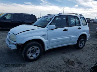 1999 Suzuki Grand Vitara JLX z VIN JS3TD62V6X4108432, wystawiony jako Copart lot #71856914 z przebiegiem 185 537 mil mil oraz Szkoda całkowita • Salvage title. Historia ofert i sprzedaży dostępna na DreamBid. Obrazek 1.