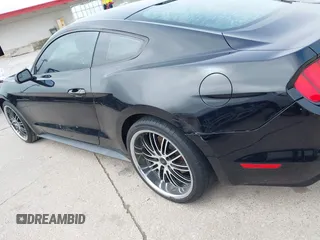 2016 Ford Mustang V6 z VIN 1FA6P8AM3G5256187, wystawiony jako IAAI lot #42415645 z przebiegiem 141 235 mil mil oraz . Historia ofert i sprzedaży dostępna na DreamBid. Obrazek 14.