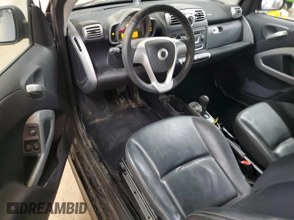 2009 Smart fortwo Pure z VIN WMEEJ31X99K209790, wystawiony jako Copart lot #51102685 z przebiegiem 30 389 mil mil oraz Szkody całkowita. Historia ofert i sprzedaży dostępna na DreamBid. Obrazek 8.