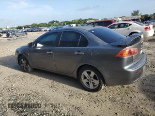 2008 Mitsubishi Lancer DE with VIN JA3AU26U78U009800, listed as a Copart auction lot 70451004 with 178,268 mi miles and Clean Title. Bid and sale history available at DreamBid. Image 2.