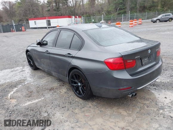 2013 BMW 3 Series 328i xDrive with VIN WBA3B3C56DF542509, listed as a IAAI auction lot 42010587 with 187,082 mi miles. Bid and sale history available at carsss.com. Image 3.