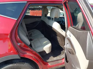 2014 Hyundai Santa Fe with VIN 5XYZT3LB1EG134837, listed as a IAAI auction lot 42454126 with 118,225 mi miles and . Bid and sale history available at DreamBid. Image 8.