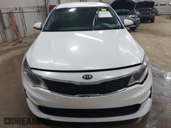2016 Kia Optima LX with VIN 5XXGT4L39GG048740, listed as a IAAI auction lot 42103300 with 111,574 mi miles and . Bid and sale history available at DreamBid. Image 12.