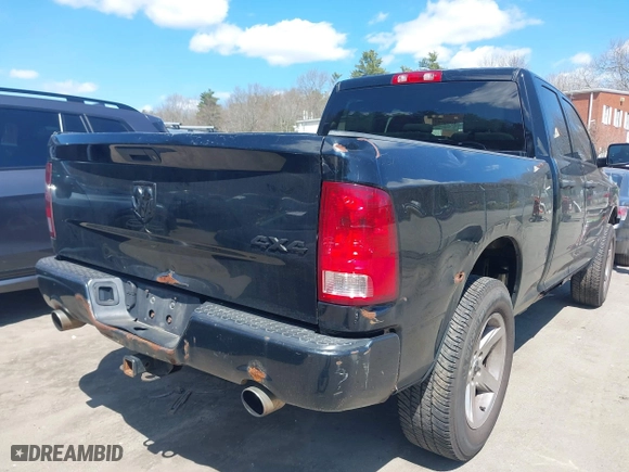 2014 Ram 1500 Express with VIN 1C6RR7FTXES143452, listed as a IAAI auction lot 42050917 with 310,525 mi miles. Bid and sale history available at carsss.com. Image 4.