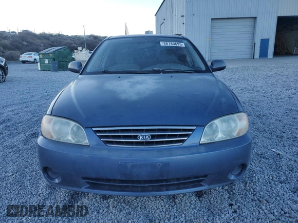 2003 Kia Spectra z VIN KNAFB121435232105, wystawiony jako Copart lot #88780695 z przebiegiem 161 466 mil mil oraz Szkoda całkowita • Salvage title. Historia ofert i sprzedaży dostępna na DreamBid. Obrazek 5.