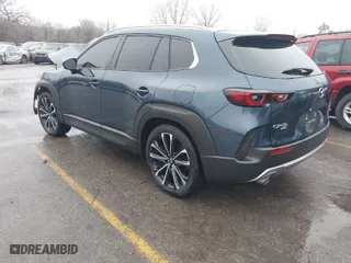 2024 Mazda CX-50 2.5 Turbo with VIN 7MMVABXY6RN156599, listed as a IAAI auction lot 41162244 with 10,042 mi miles. Bid and sale history available at carsss.com. Image 3.