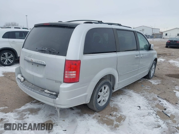 2010 Chrysler Town & Country Touring with VIN 2A4RR5D18AR250438, listed as a IAAI auction lot 41614646 with 271,504 mi miles. Bid and sale history available at carsss.com. Image 4.
