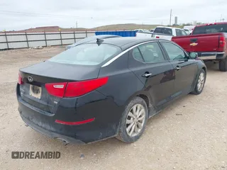 2015 Kia Optima LX with VIN 5XXGM4A71FG399420, listed as a IAAI auction lot 41928688 with 163,440 mi miles. Bid and sale history available at carsss.com. Image 4.