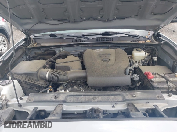 2021 Toyota Tacoma SR with VIN 5TFCZ5AN3MX258746, listed as a IAAI auction lot 42252967 with 62,095 mi miles and . Bid and sale history available at DreamBid. Image 10.