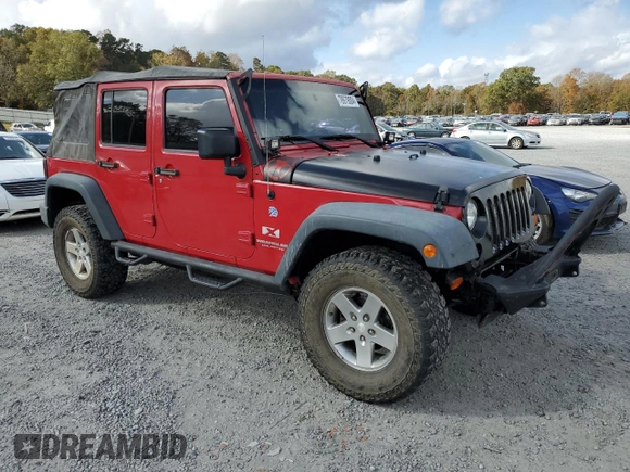 2008 Jeep Wrangler Unlimited X with VIN 1J4GB39198L515007, listed as a Copart auction lot 78979004 with 158,929 mi miles and Salvage Title. Bid and sale history available at DreamBid. Image 4.