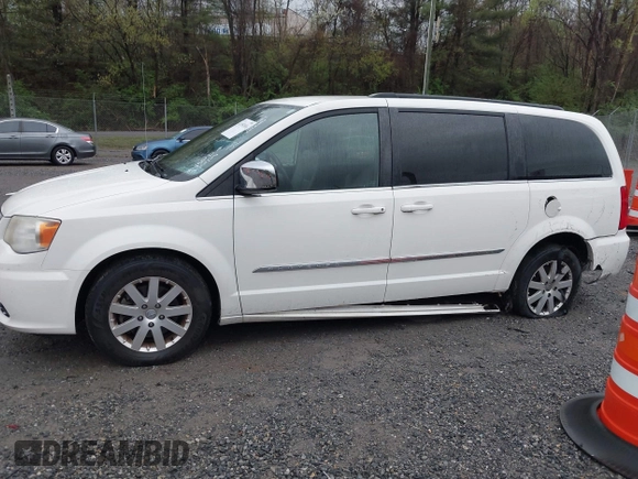 2012 Chrysler Town & Country Touring L with VIN 2C4RC1CG6CR137841, listed as a IAAI auction lot 41951936 with 264,211 mi miles and . Bid and sale history available at carsss.com. Image 14.