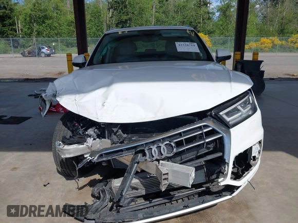 2018 Audi Q5 with VIN WA1BNBFY1J2131926, listed as a IAAI auction lot 42328714 with 79,752 mi miles and . Bid and sale history available at DreamBid. Image 13.