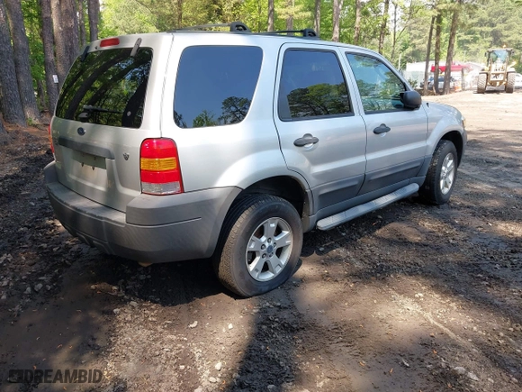 2007 Ford Escape XLT with VIN 1FMCU93167KA51832, listed as a IAAI auction lot 42115125 with 148,584 mi miles. Bid and sale history available at carsss.com. Image 4.