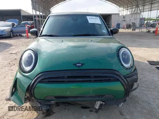 2022 MINI Hardtop 4 Door Cooper z VIN WMW33DK04N2P84250, wystawiony jako IAAI lot #42059692 z przebiegiem 34 238 mil mil oraz . Historia ofert i sprzedaży dostępna na DreamBid. Obrazek 13.