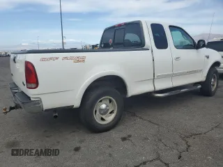 2001 Ford F-150 XL z VIN 1FTRX18L21NA29205, wystawiony jako Copart lot #58928795 z przebiegiem Nie podano mil oraz Szkoda całkowita • Salvage title. Historia ofert i sprzedaży dostępna na DreamBid. Obrazek 3.