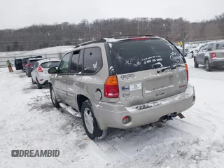 2002 GMC Envoy SLT with VIN 1GKDT13S022333743, listed as a IAAI auction lot 41562458 with 193,087 mi miles. Bid and sale history available at carsss.com. Image 3.