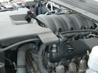 2015 Chevrolet Suburban LT z VIN 1GNSKJKC1FR604376, wystawiony jako IAAI lot #42775391 z przebiegiem 126 931 mil mil oraz . Historia ofert i sprzedaży dostępna na DreamBid. Obrazek 19.