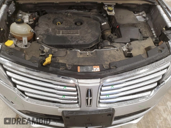 2018 Lincoln MKC Premiere with VIN 5LMCJ1C90JUL07472, listed as a Copart auction lot 50595015 with 74,989 mi miles and Salvage Title. Bid and sale history available at DreamBid. Image 12.