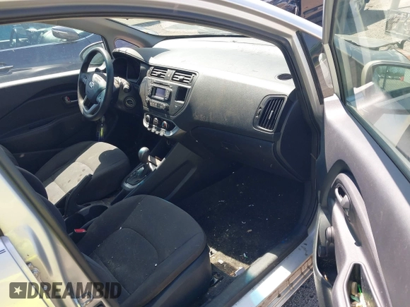 2013 Kia Rio LX with VIN KNADM5A33D6307061, listed as a IAAI auction lot 42143985 with 66,621 mi miles and . Bid and sale history available at DreamBid. Image 5.